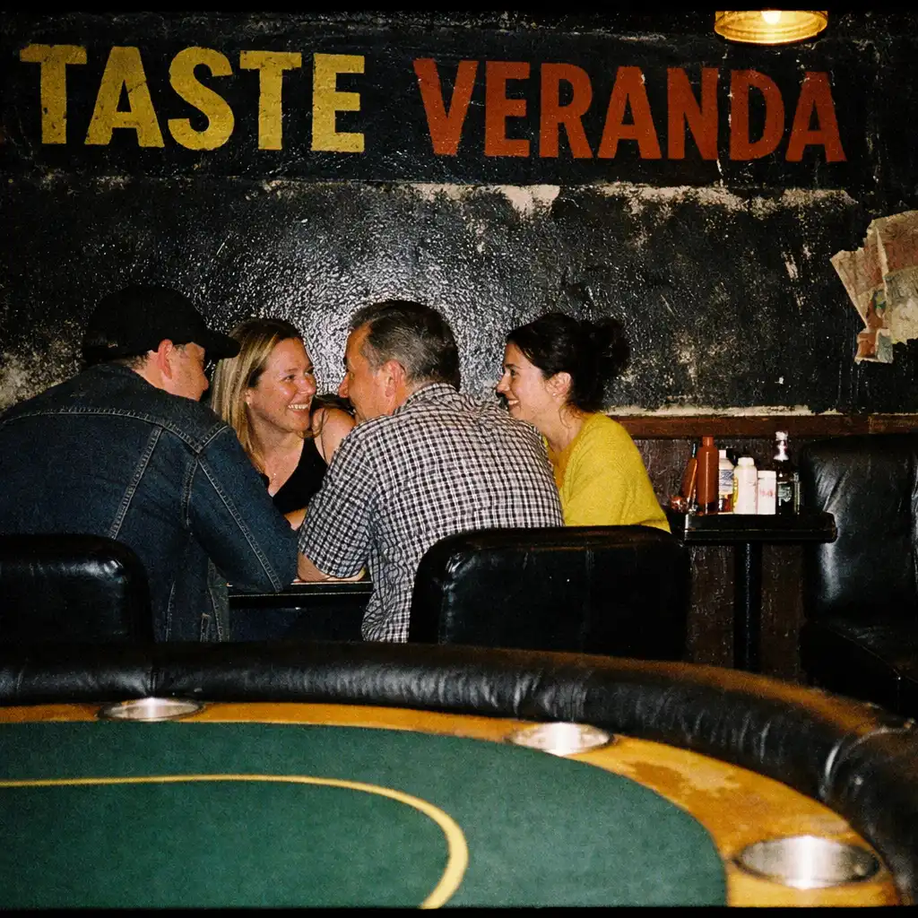 An after-hours TASTE VERANDA room corner with a physical table detail and diners in conversation.